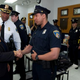 Attorney General Loretta Lynch meets Baltimore police officers during a visit to the Central District of the Baltimore Police Department on May 5, 2015. Lynch was in Baltimore to meet with the family of Freddie Gray and faith leaders in the aftermath of Gray’s death while in police custody, which touched off protests and unrest.
Jose Luis Magana-Pool/Getty Images